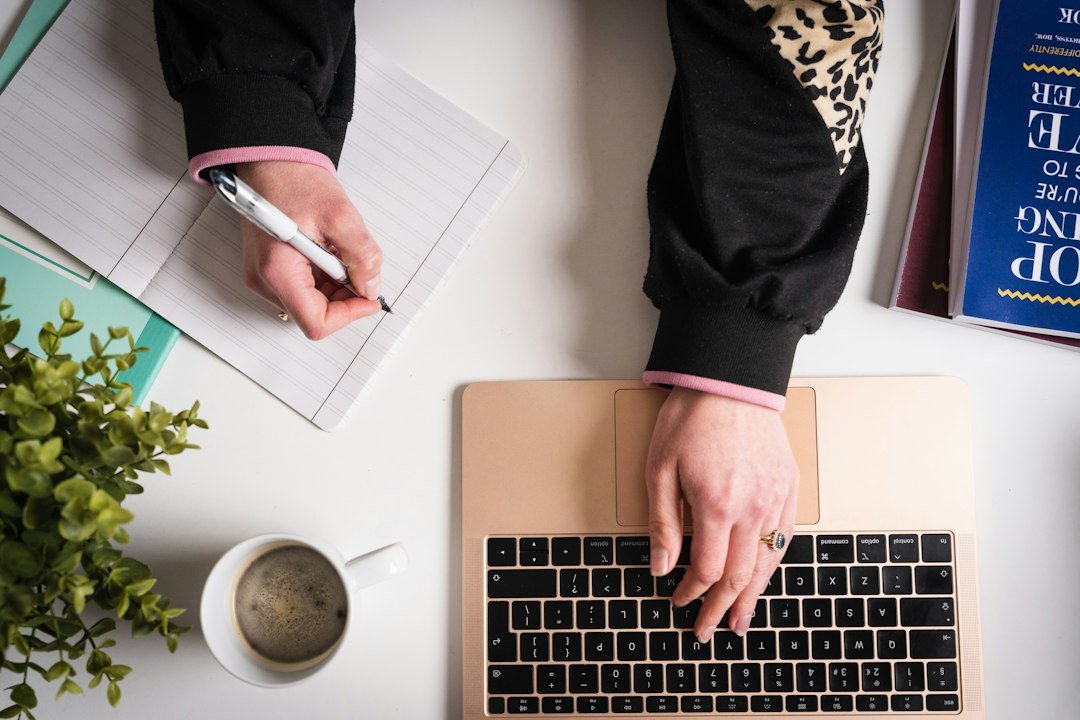 Person using a laptop to submit a home service request online