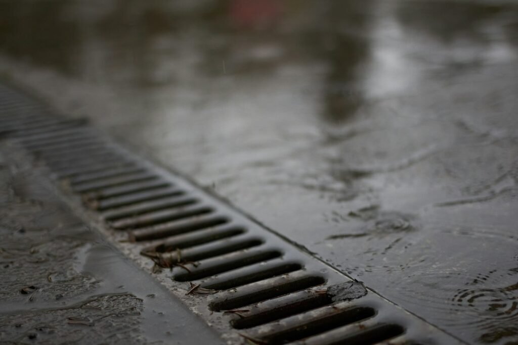Wet floor drain illustrating a drain or sewer backup cleanup situation